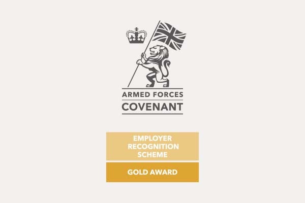 Armed Forces Covenant Employer Recognition Scheme Gold Award logo with lion and flag.