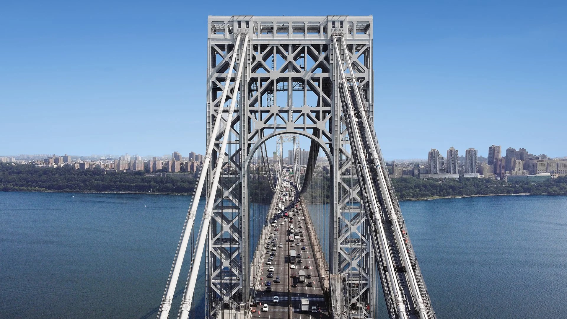 George Washington Bridge with Traffic Over the Hudson River Aerial view of George Washington Bridge with traffic over the Hudson River, NYC.