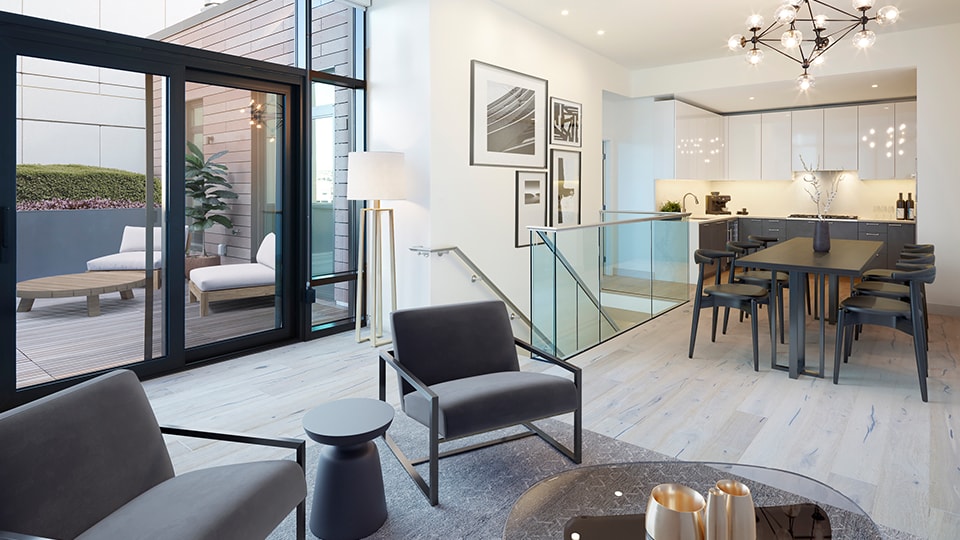 Modern open-plan living room and kitchen with natural light Open-plan living room with sleek kitchen, glass doors, and minimalist furniture.