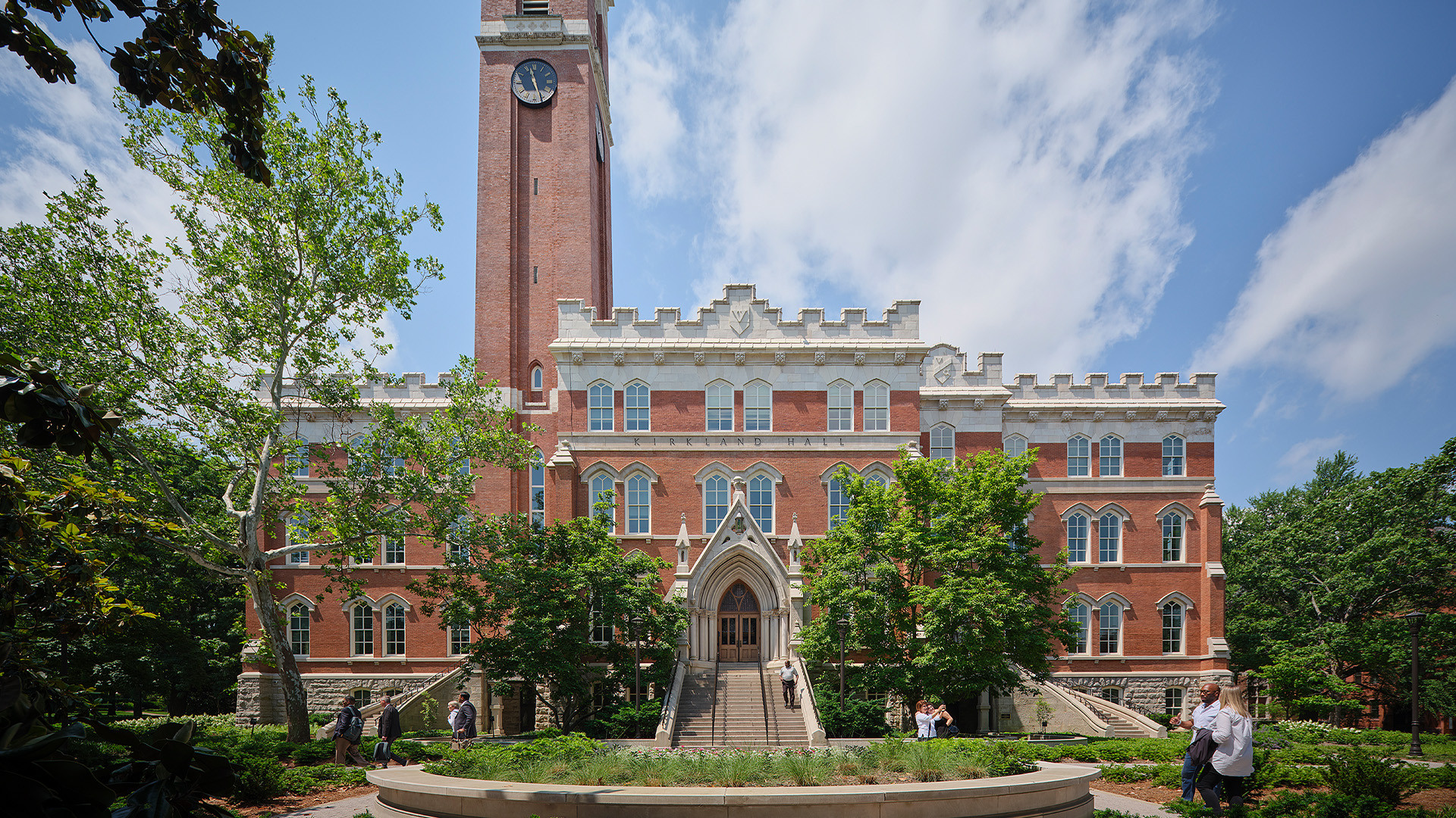 Education lab with Orange Chairs and Advanced Equipment Overhead view of Vanderbilt University logo on tiled floor with white chairs around.