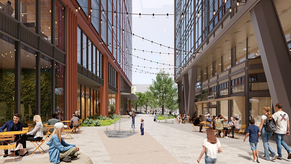 Modern Urban Pedestrian Plaza with Outdoor Seating and Greenery Outdoor urban plaza with people dining, walking, and modern buildings on both sides.