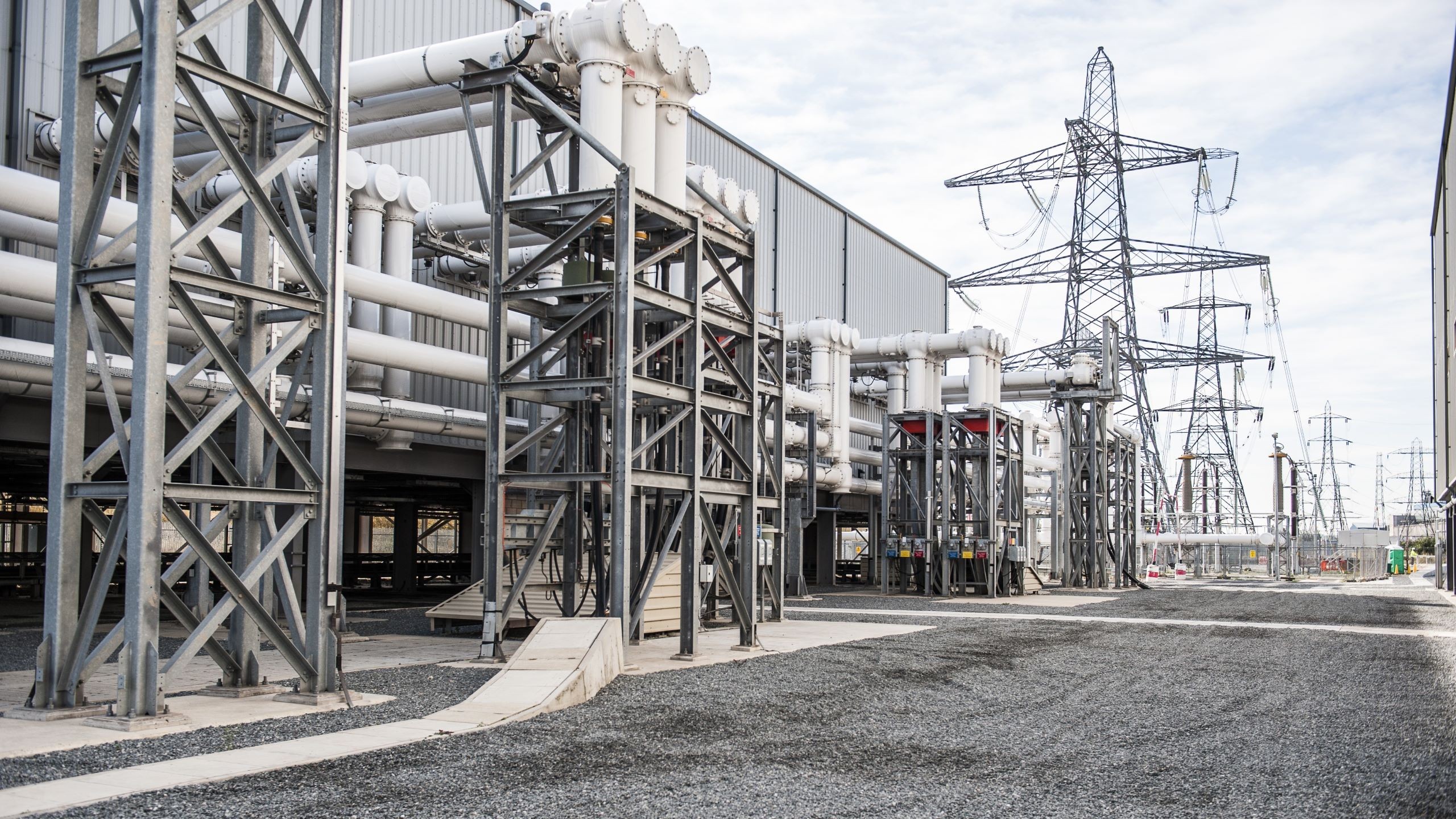 Tilbury Substation Industrial power plant infrastructure with metal frameworks and overhead pipes.