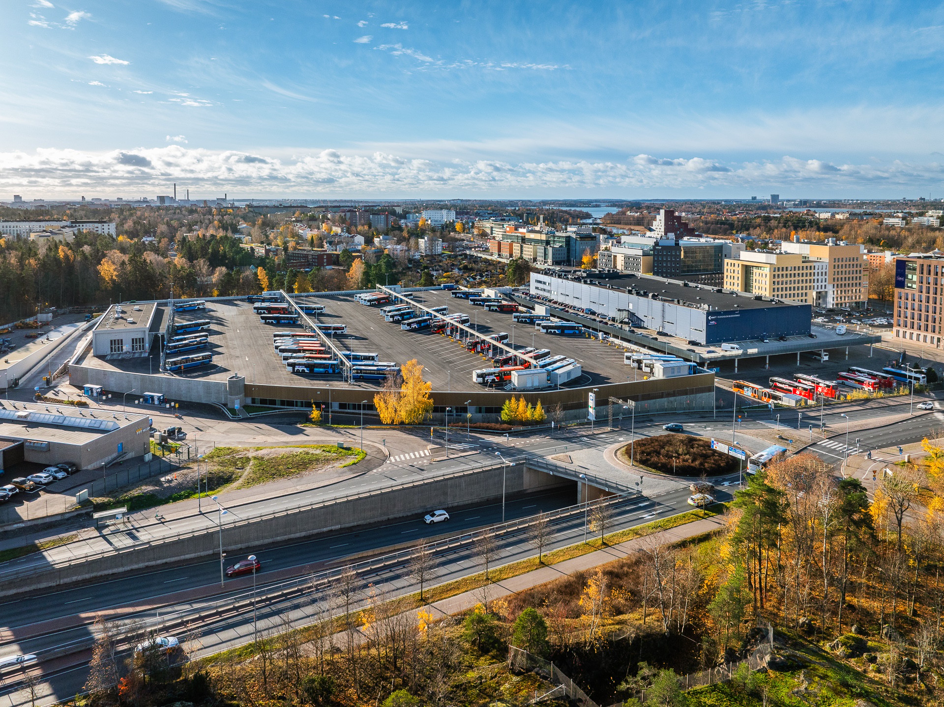 Aerial view of a large bus and tram depot.