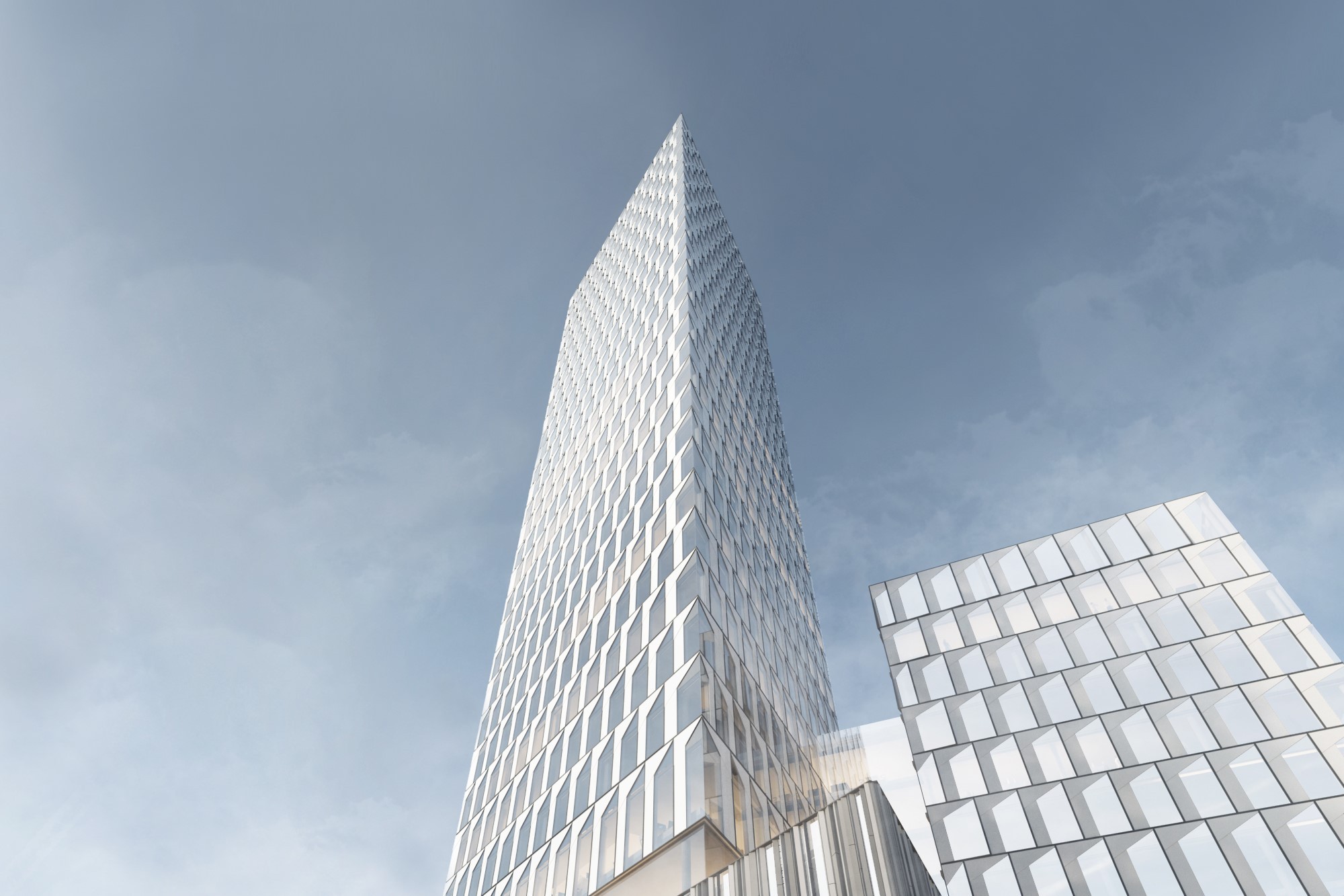Modern skyscraper with reflective glass facade against a cloudy sky, showcasing contemporary architecture.