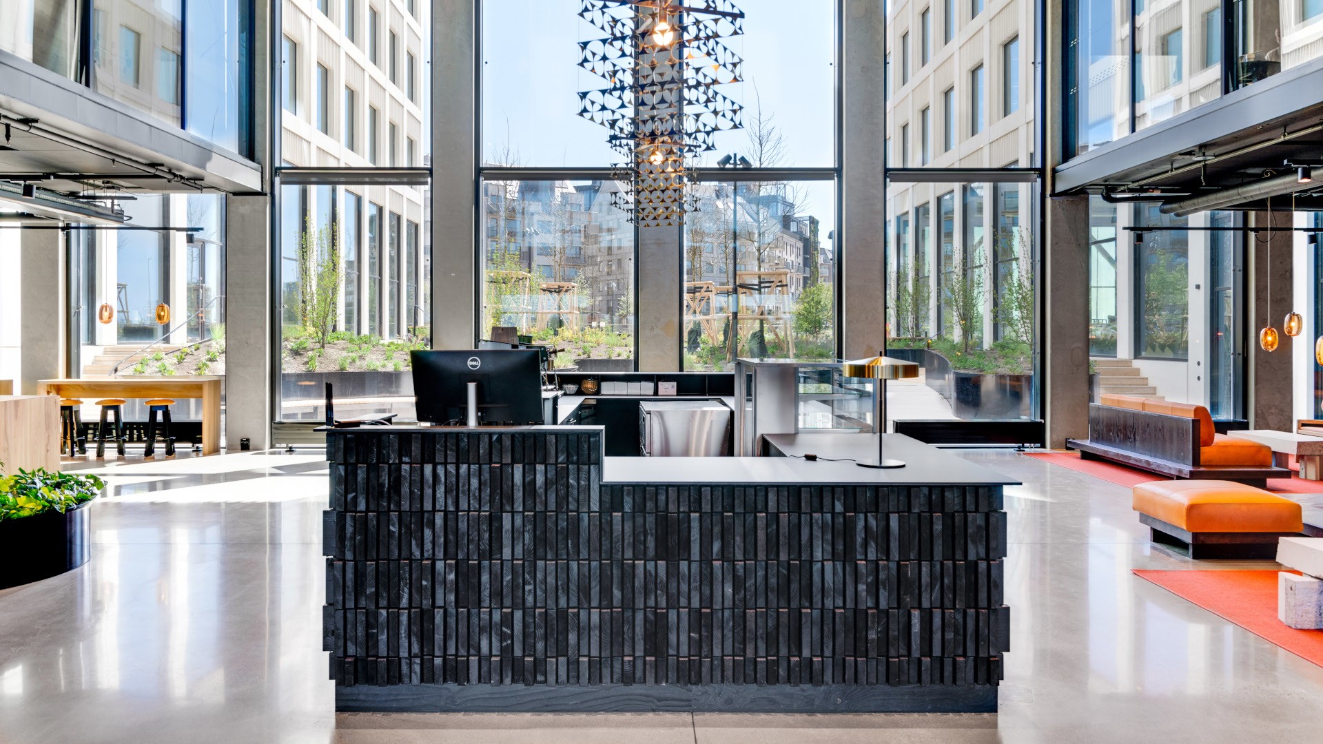 In the public atrium there is a reception with café, restaurant, lounge area and a bicycle hotel with dressing room A public atrium