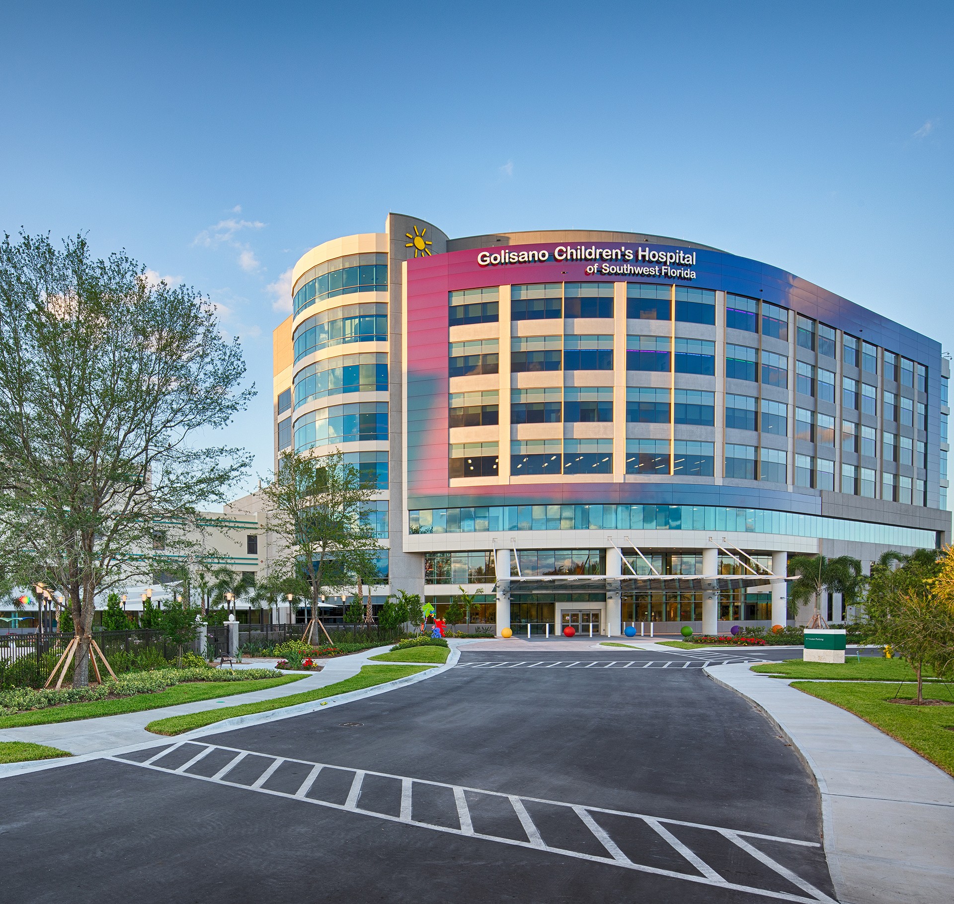 Exterior view of Golisano Children's Hospital of Southwest Florida with colorful windows.