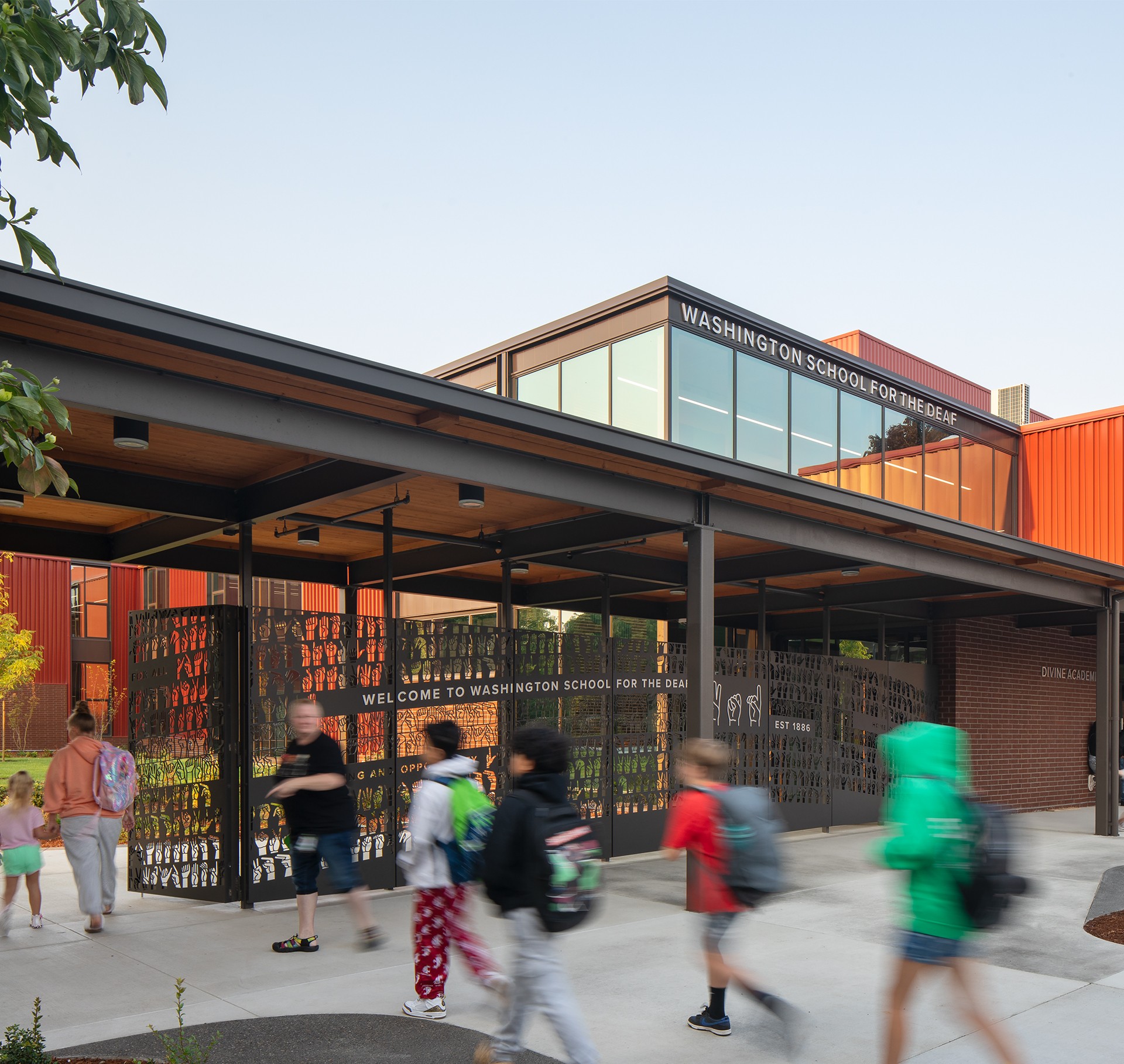 Washington School for the Deaf Entrance with Students Walking Entrance of Washington School for the Deaf with children walking in front, modern building.