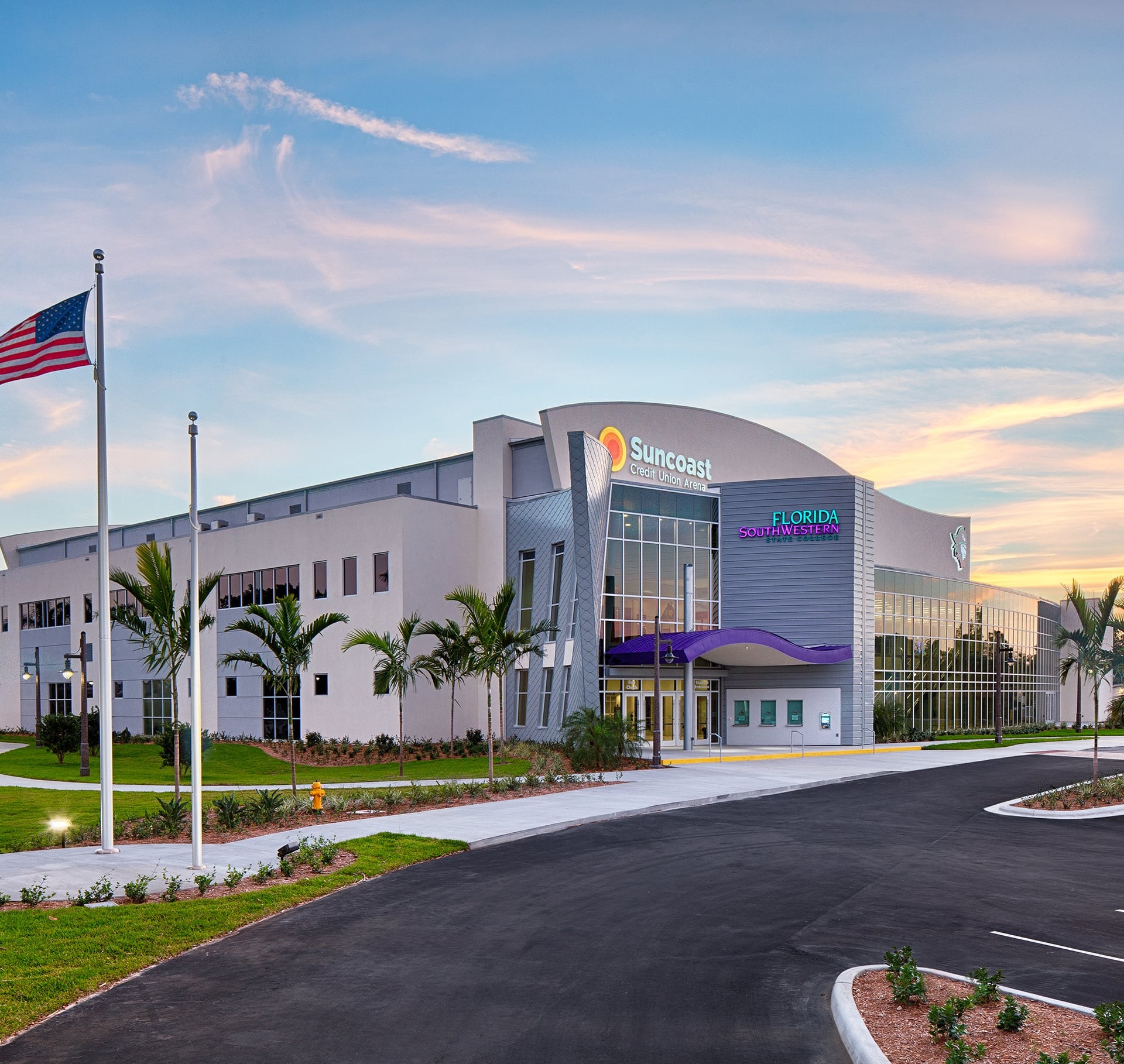Suncoast Credit Union Arena at Florida Southwestern College Modern Suncoast Credit Union Arena with Florida Southwestern College signage and palm trees.