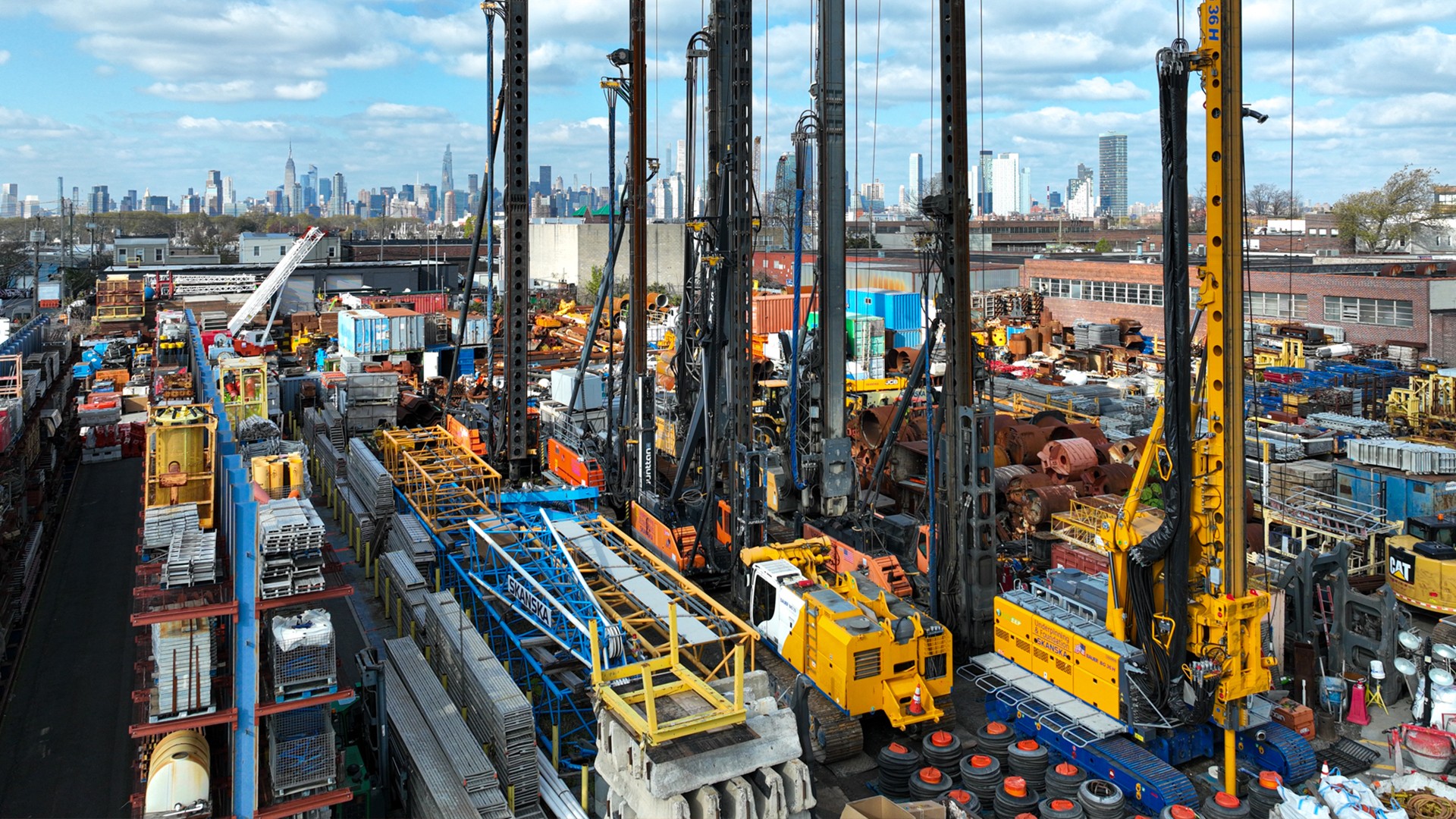 Urban construction site with heavy drilling machines and equipment Construction site with heavy machinery and equipment in an urban industrial area.