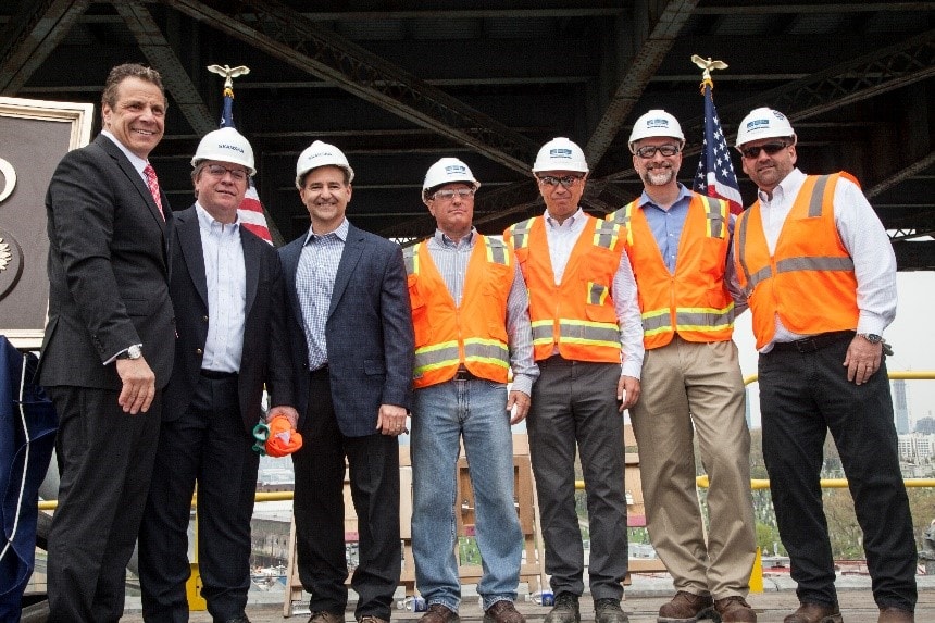 Skanska and Kiewit executives and Governor Andrew Cuomo celebrate the grand opening of the Queens-bound span of the new Kosciuszko Bridge on April 27, 2017.