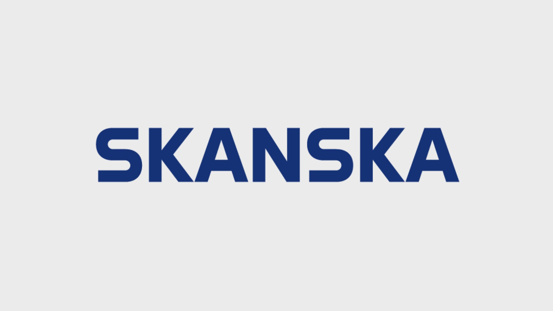 Blue Skanska logo on a light gray background, representing a global construction company.