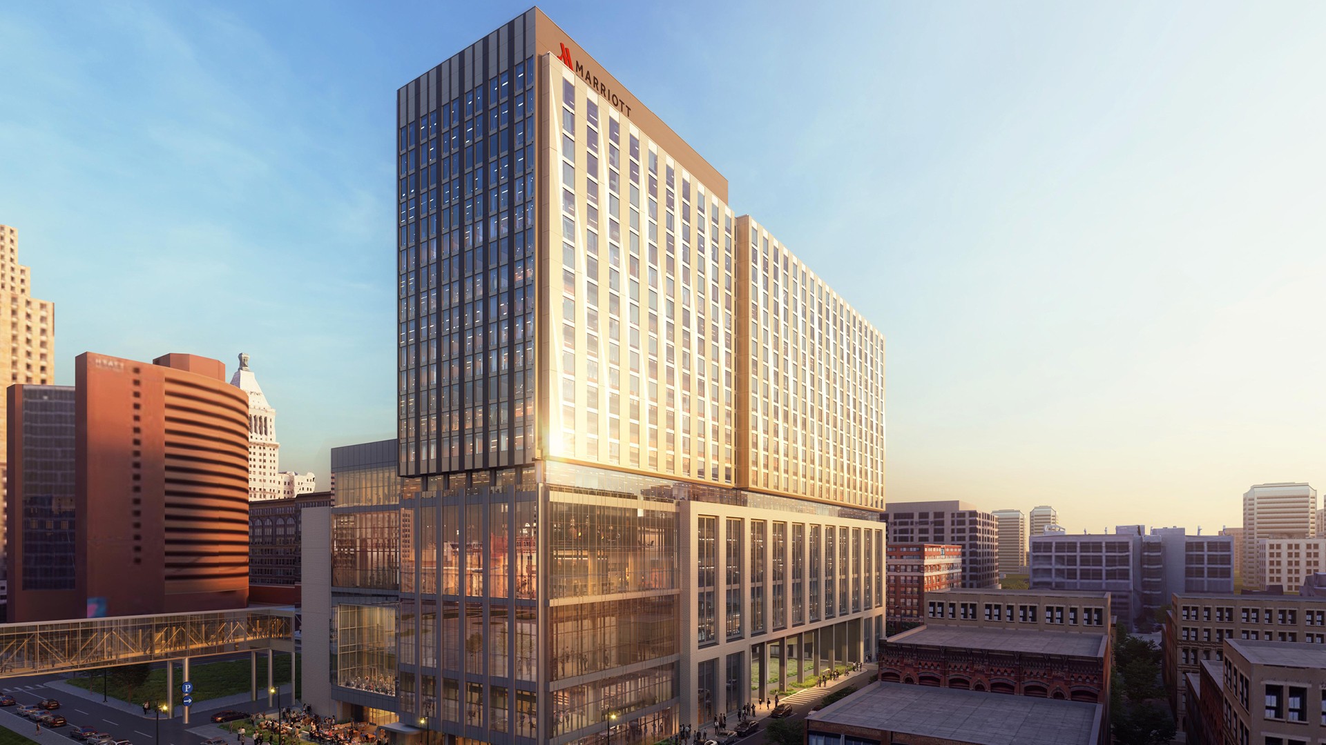 Modern Marriott Hotel Building in Urban Cityscape at Sunset Modern Marriott hotel building with glass windows in an urban cityscape at sunset.