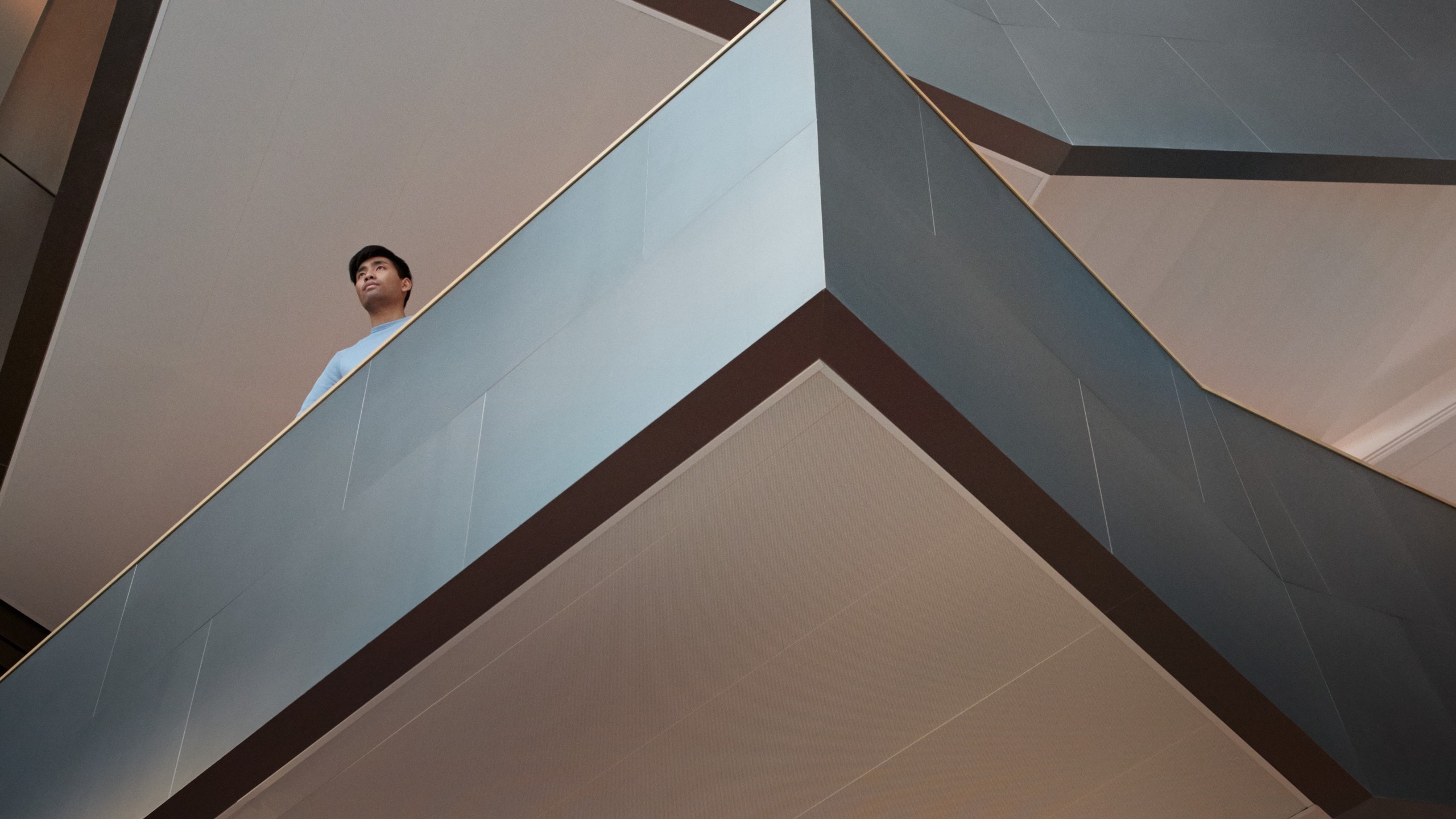Modern architectural design showcasing sharp angles and contrasting geometric patterns.