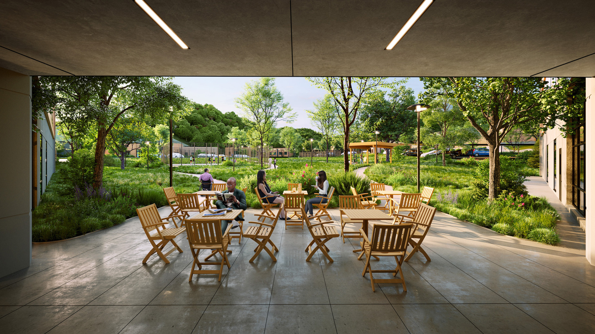 Outdoor Patio Seating Area with People Relaxing in Green Park Outdoor patio with wooden chairs and people enjoying a sunny day in a green park.