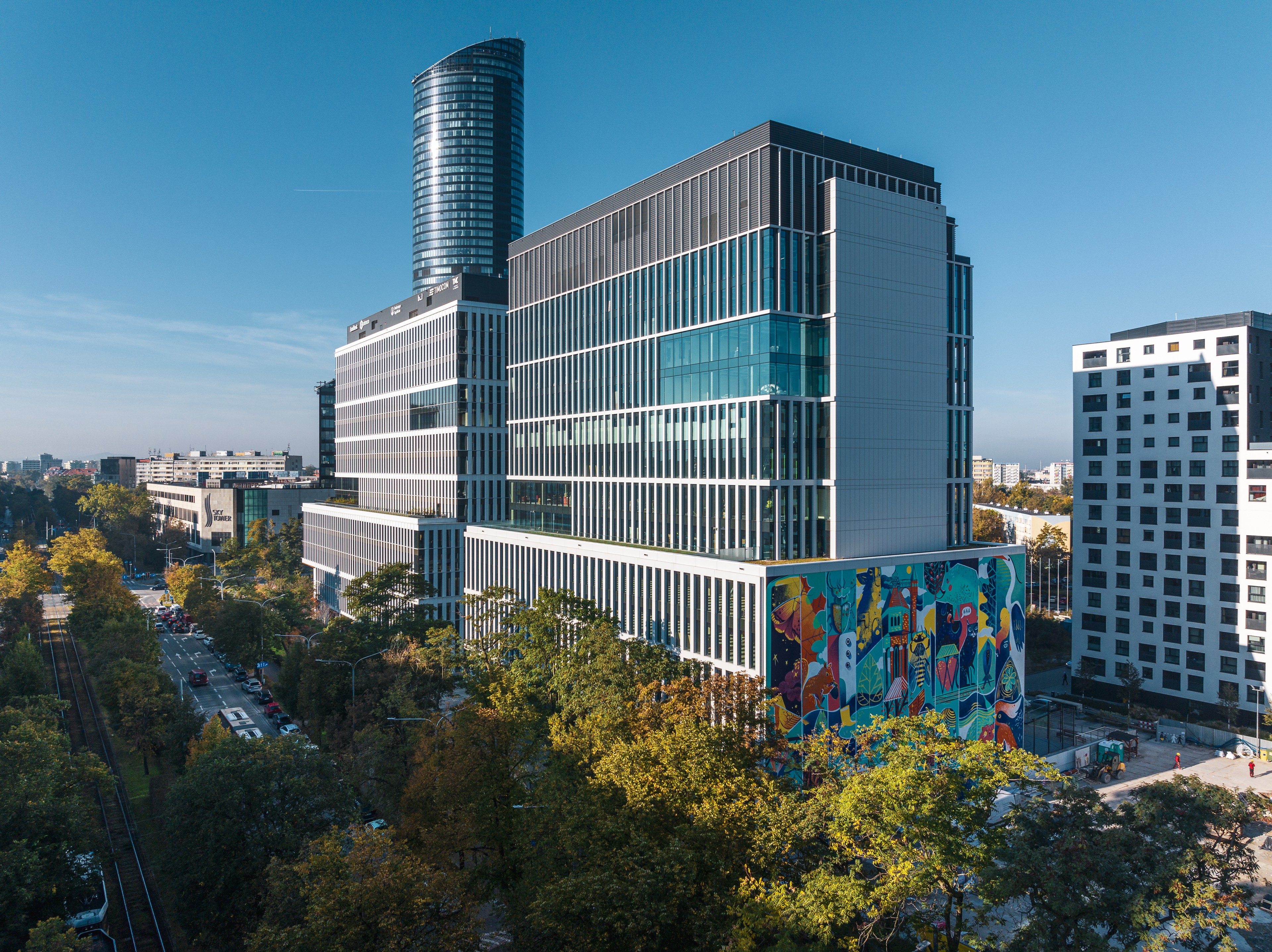 Centrum Południe complex featuring a large colorful mural on a lower facade. Wrocław City