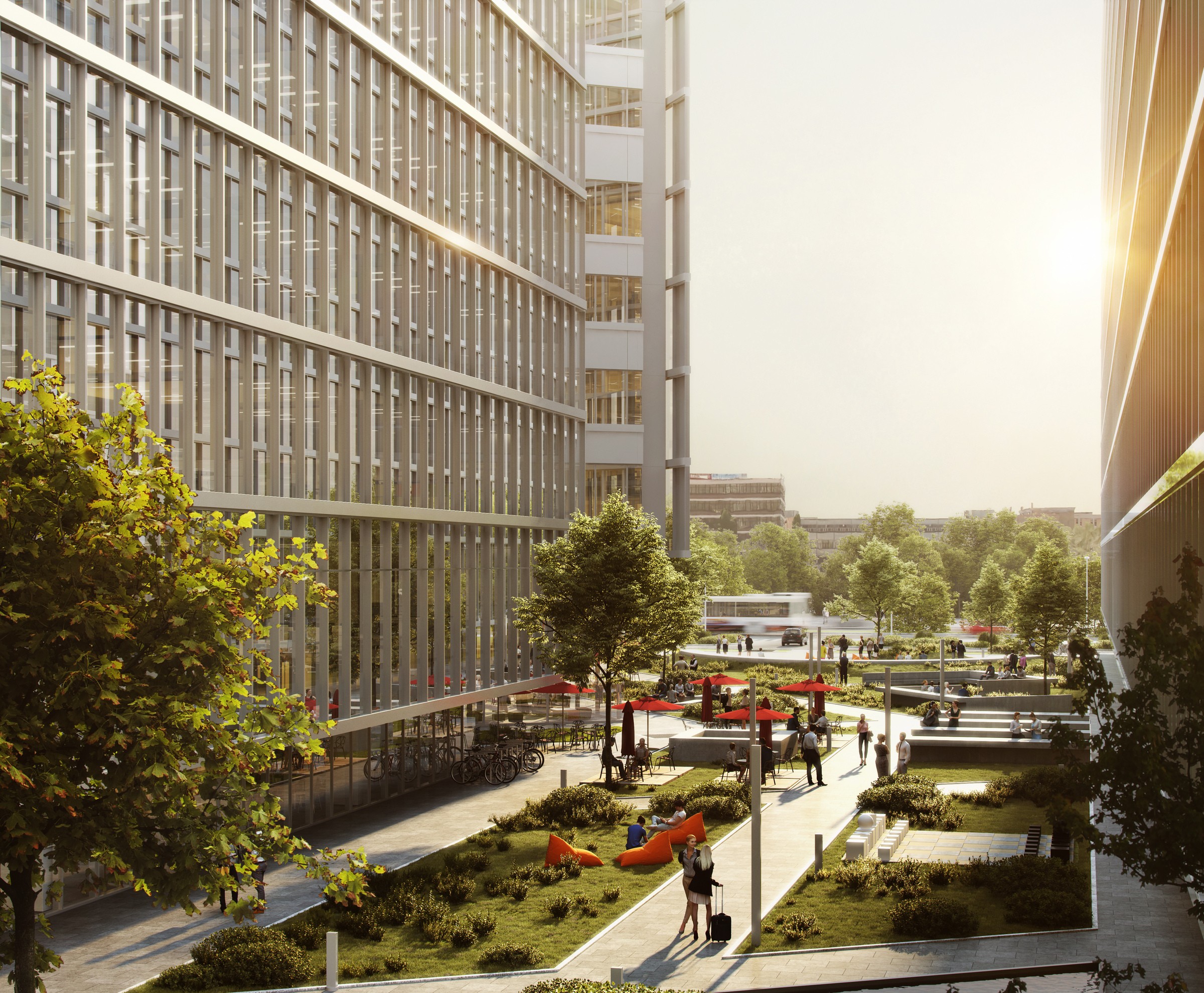 Curte urbană modernă cu clădiri de birouri, spații verzi și oameni care se bucură de zona în aer liber.
