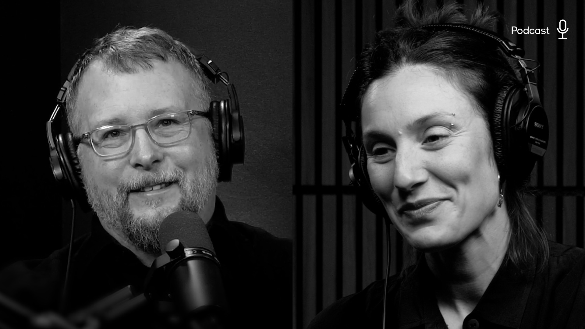 Podcast Hosts in Studio with Professional Equipment Two individuals wearing headphones in a professional podcast recording studio environment.