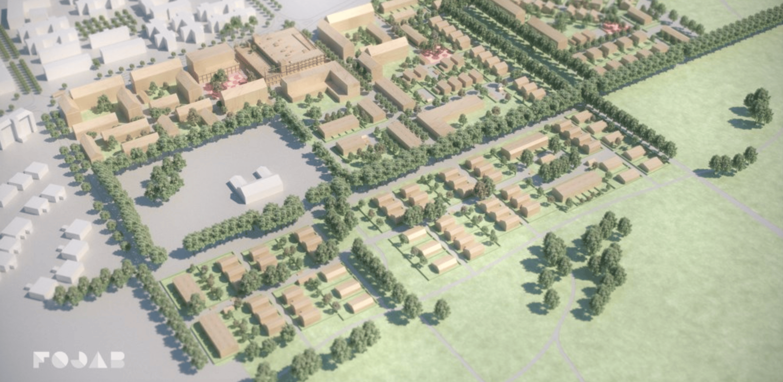 Flygvy över ett planerat bostadsområde med hus, träd och grönområden.