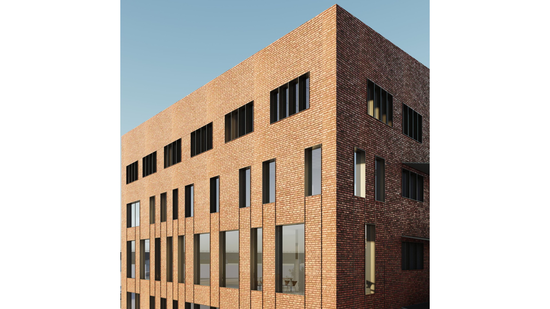 Modern brick building with large rectangular windows against a clear blue sky.