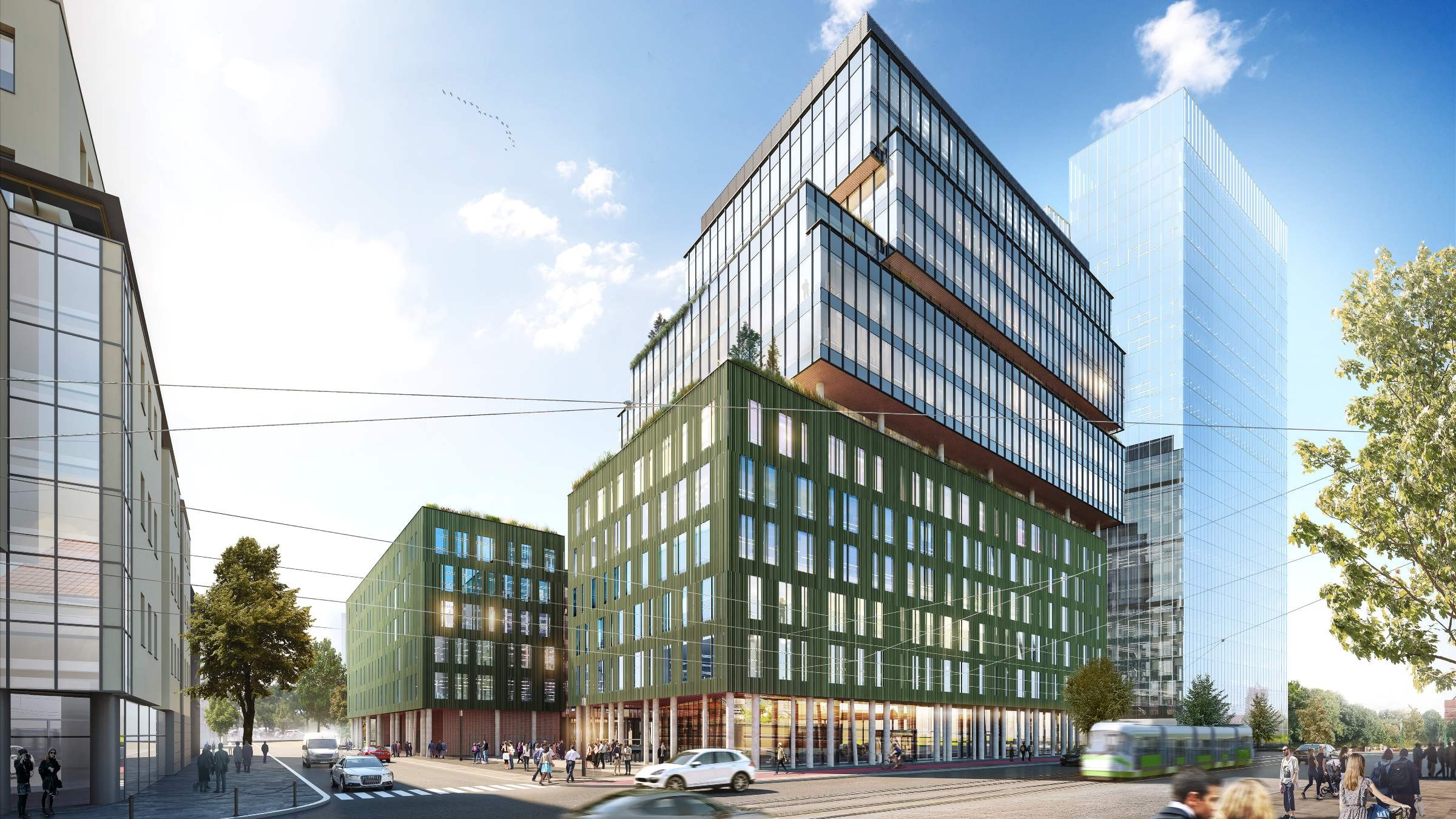 Moderna flerbostadshus med glasfasader på ett livligt stadshörn.