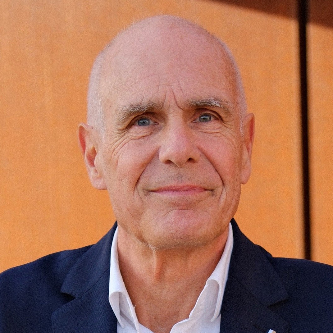 Anders Lilienberg A person in a dark polo shirt is sitting indoors, with a neutral-colored wall in the background.