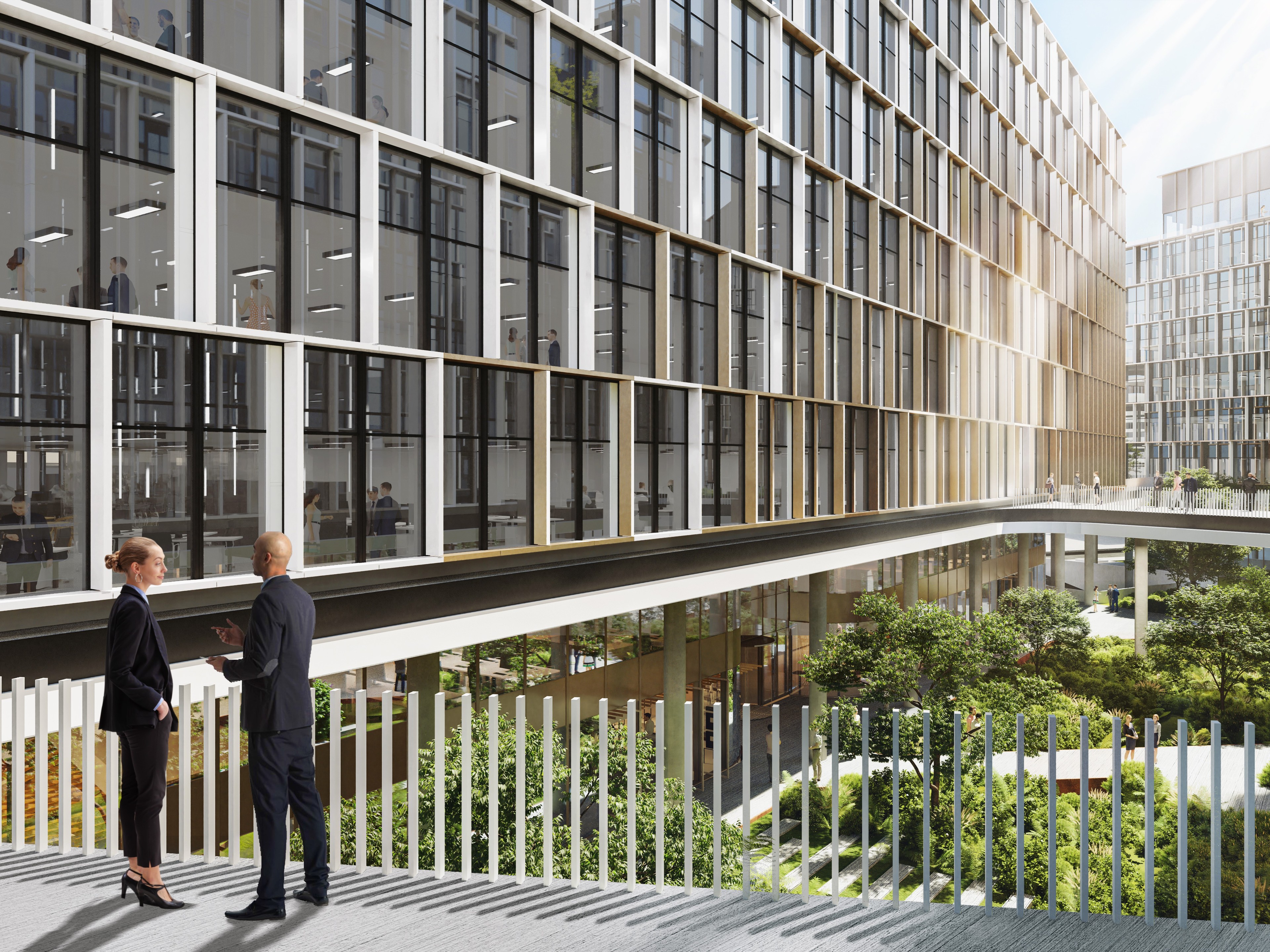 H₂Offices placemaking Modern courtyard with greenery, people walking, and buildings featuring large glass windows.