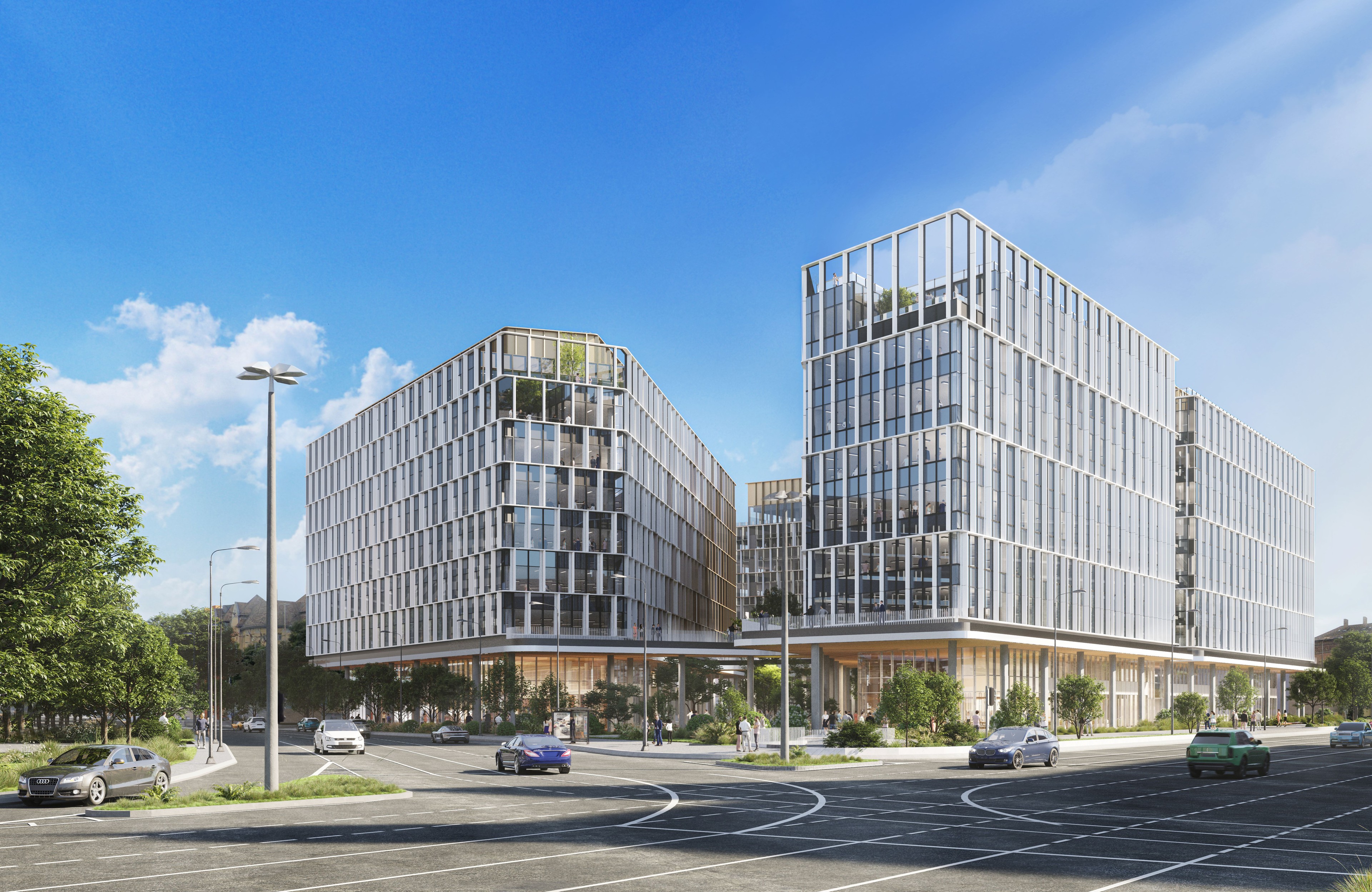 H₂Offices Phase 2 H₂Offices Phase 2, a modern office buildings with glass facades on a sunny day, surrounded by cars and greenery.