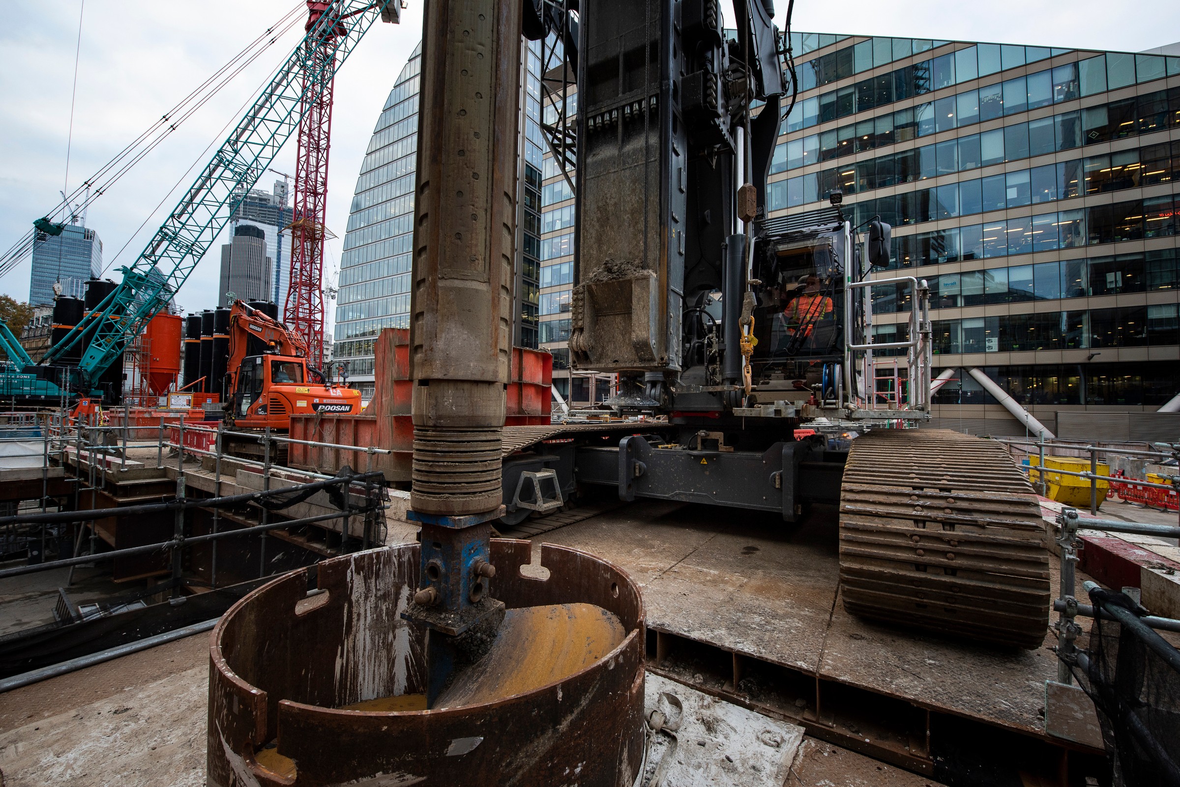 21 Moorfields Urban construction site with heavy machinery, cranes, and buildings in the background.