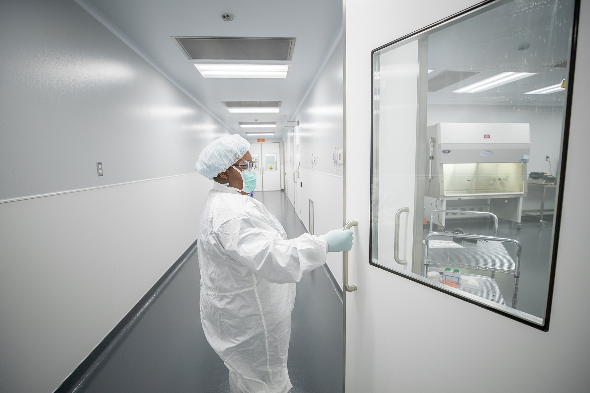Woman walks into a clean room Woman walks into a clean room