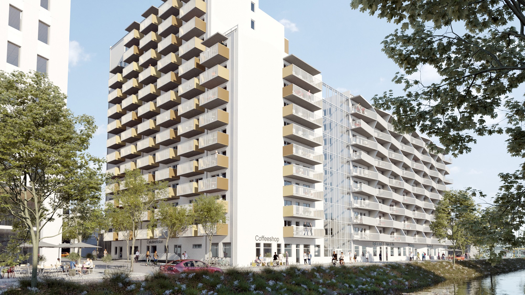 Skanska kombinerar hyresrätter och bostadsrätter i kvarteret. Modernt lägenhetskomplex med balkonger och ett kafé, omgivet av grönska och en vattenväg.