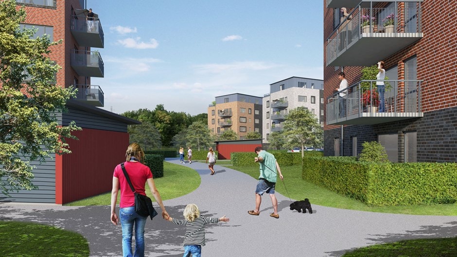 Modernt lägenhetskomplex med gångvägar, familjer och grönska för en levande gemenskapskänsla.