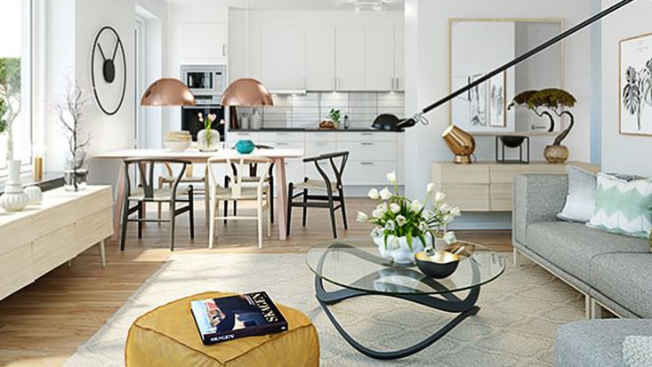 Den som bor i ett Svanenmärkt hus kan vakna upp och rädda världen lite grann. Modernt vardagsrum och matsal med neutrala toner, stilfulla möbler och dekorativa inslag.