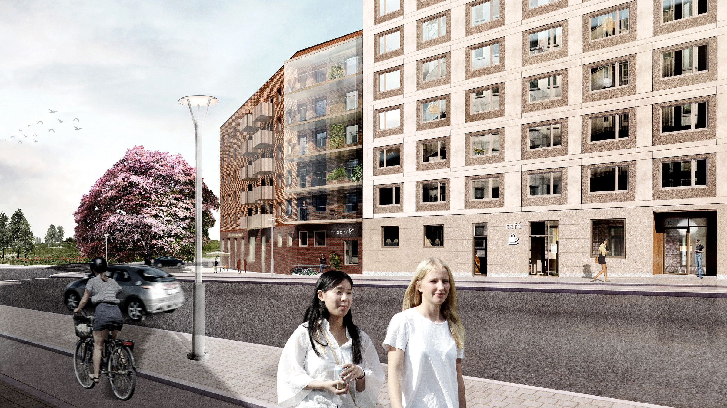 Parkkvarteret i Barkarby. Bild: Varg Arkitekter. Modern stadsbild med cyklister, fotgängare och samtida arkitektur.