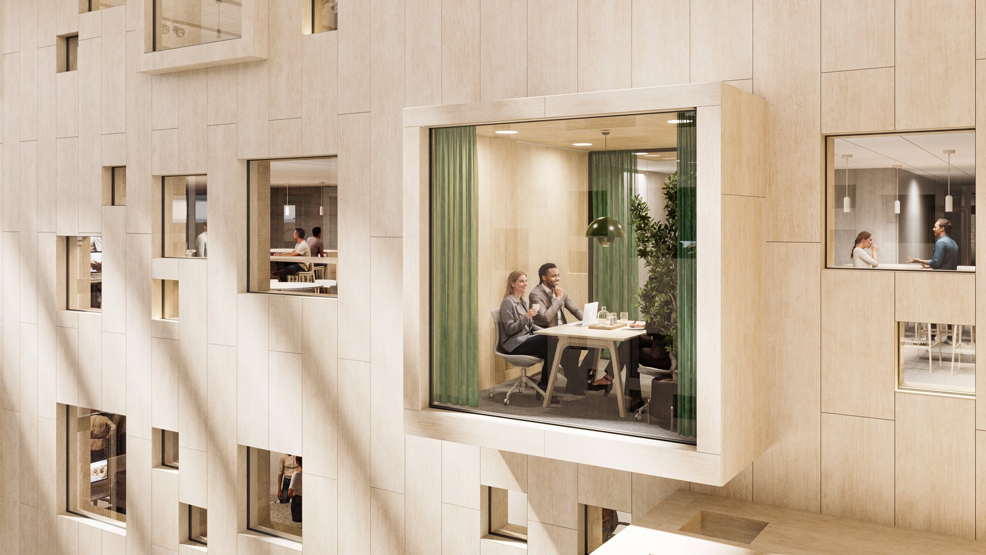 Solna Link ett mötesrum med folk som arbetar.