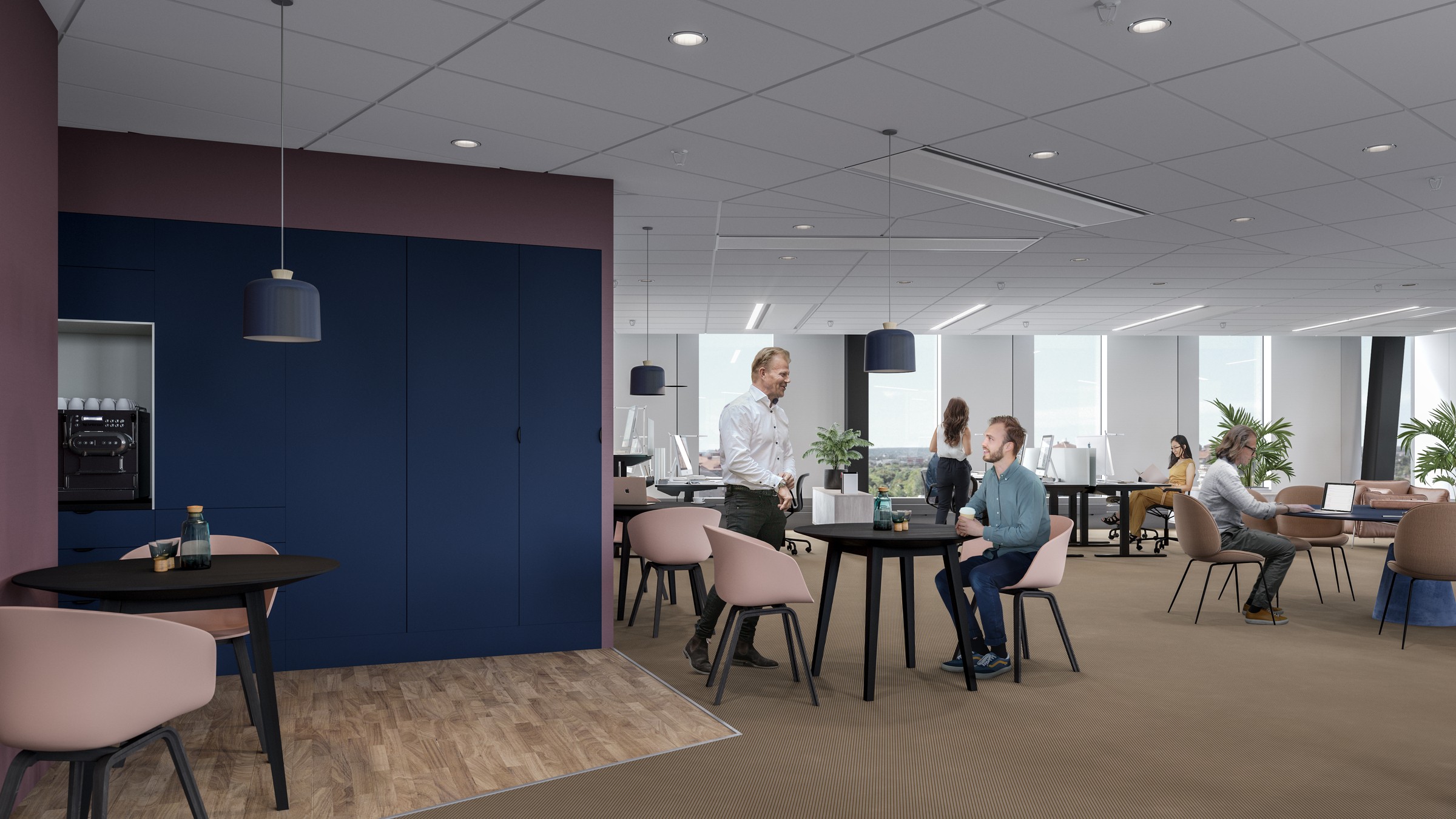 Moderna kontorsutrymmen med människor som interagerar, med runda bord, växter och en kaffestation.