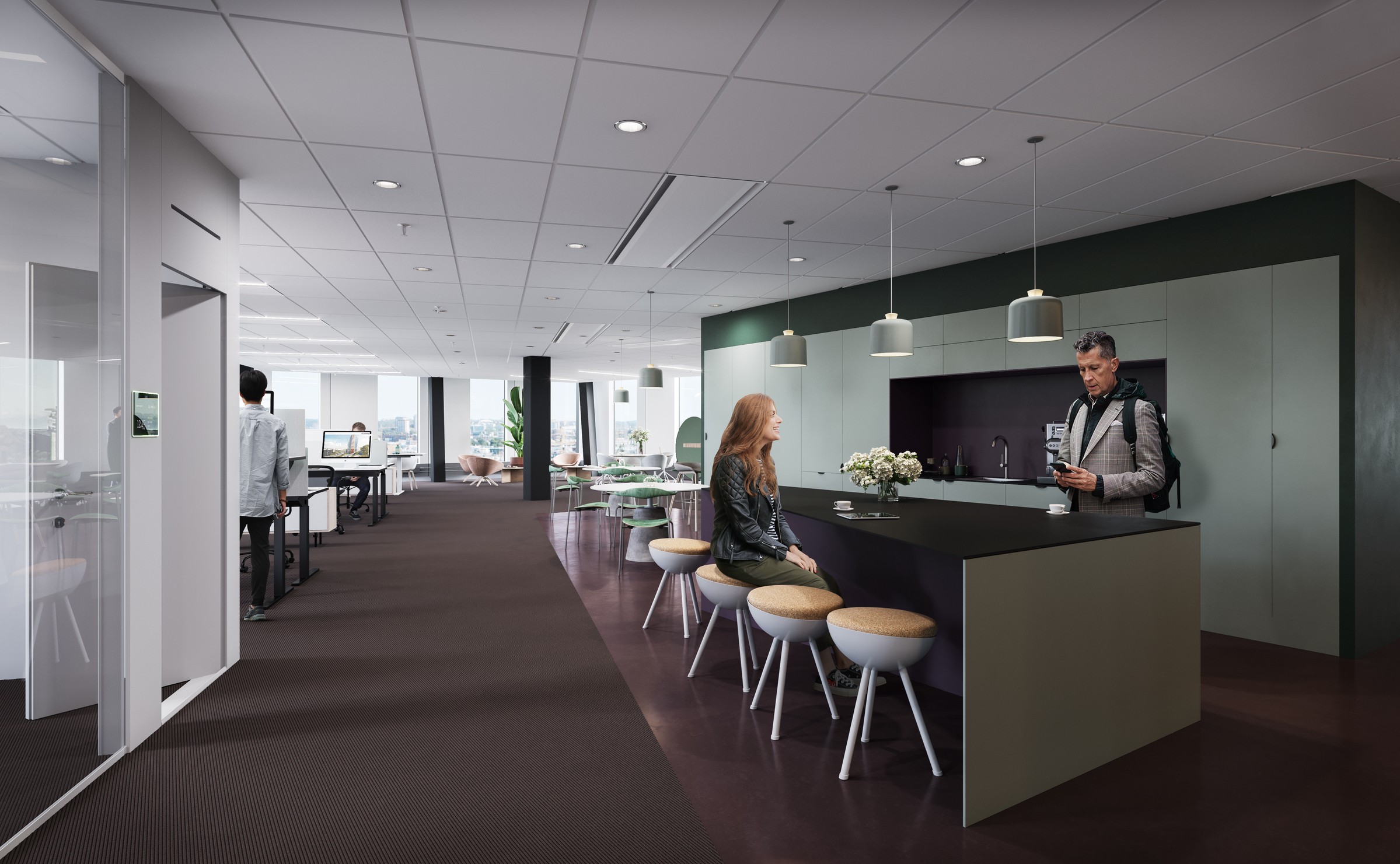 Modern kontorsyta med öppet sittområde, köksdel och moderna belysningsarmaturer.