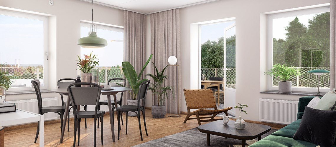 Open living area for socializing. Modern living room with wooden floors, large windows, dining area, and cozy seating arrangement.
