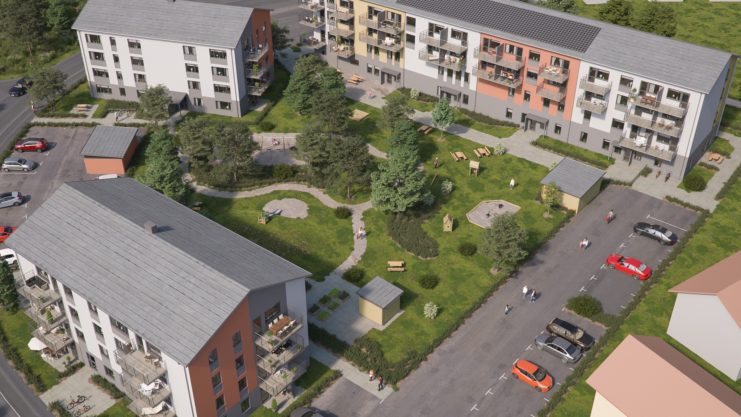 Hyresbostadsprojektet Soluppgången i Växjö. Bild: MK 3Design Studios Flygfoto av modernt lägenhetskomplex med anlagd innergård och parkeringsområden.