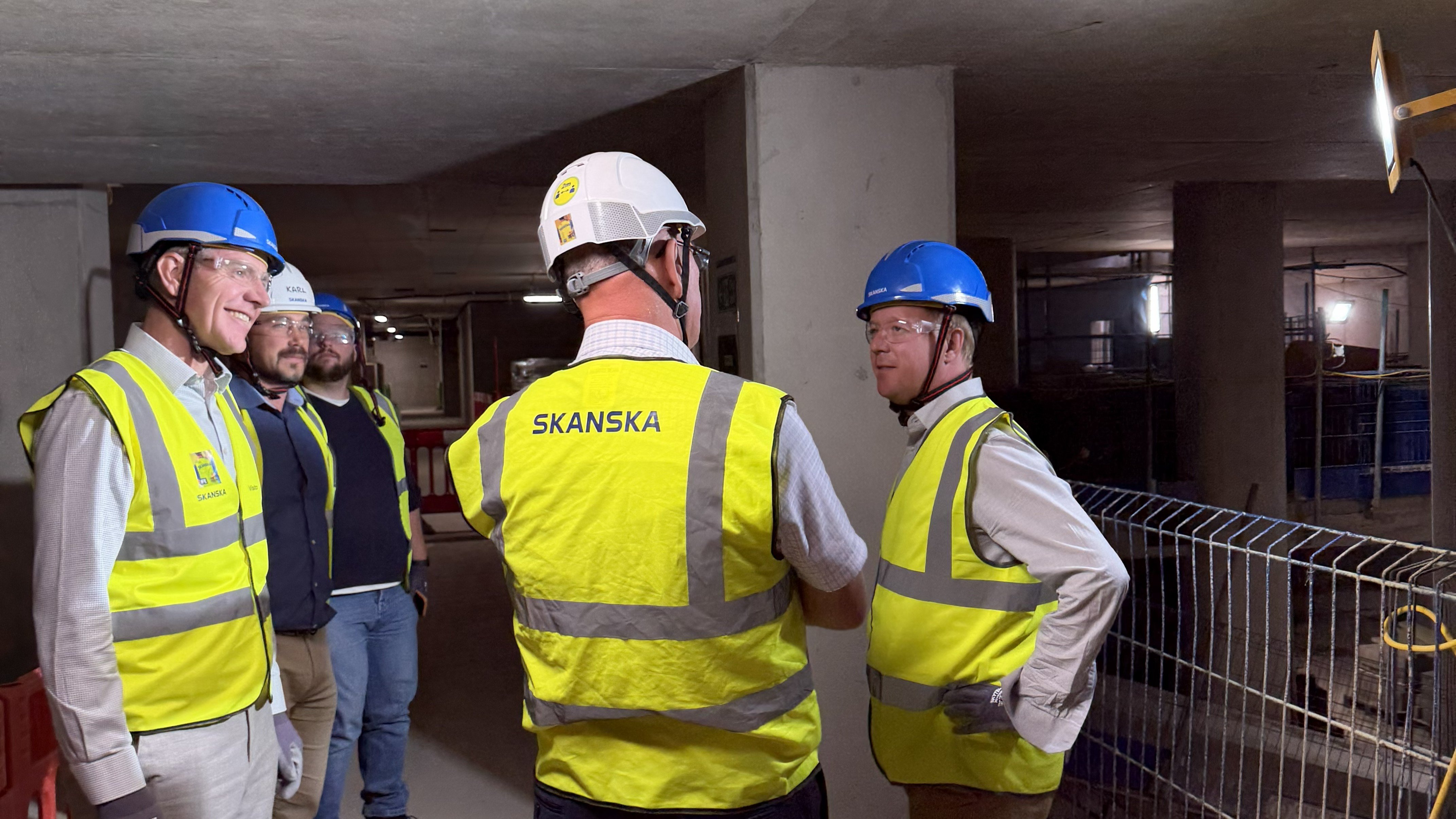 EVP Lee Marks (left) & Project Director Graham Mercer (centre) speaks with Mayor of Cambridgeshire and Peterborough (right)